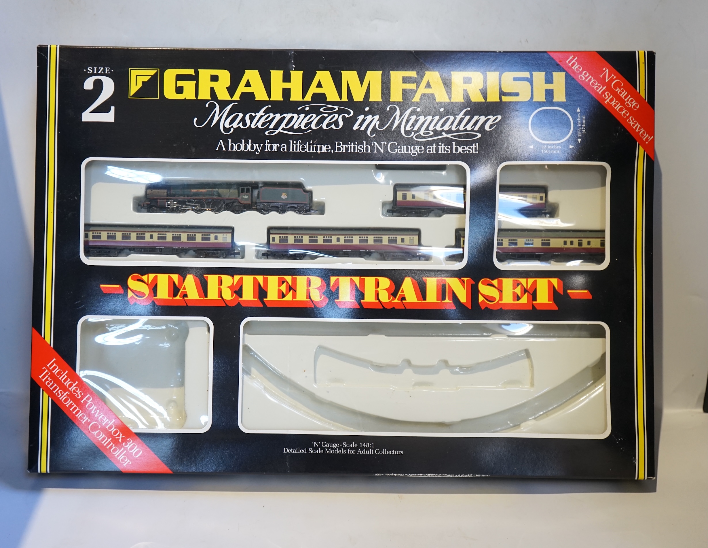 Four boxed Graham Farish N gauge railway train sets; a Diesel Freight set, comprising a Class 25 diesel locomotive and five freight wagons, together with a J94 Freight set with three wagons (370-050), a Queen Elizabeth G